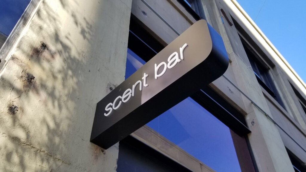 Retail Store - Scent Bar - Blade Sign - Exterior Blade Sign - Projecting Sign - Push-Thru Style Letters - Illuminated Sign