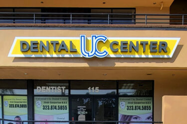 Dental Office- UC Dental Center - Face Lit Channel Letters - Storefront Sign - Illuminated Sign - Aluminum - Acrylic - LED - Outdoor Sign - Wall Sign - Building