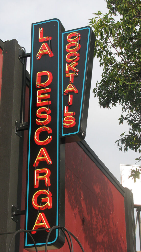 Bar Restaurant - La Descarga - Blade Sign - Exterior Blade Sign - Projecting Sign - Neon Letters - Illuminated Sign
