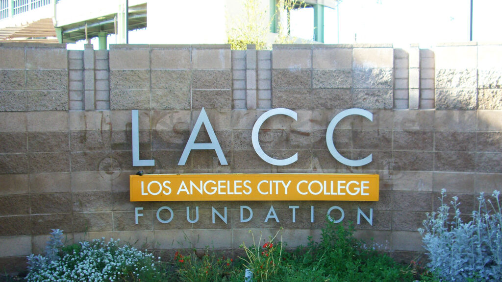 College - LACC- Architectural Sign - Aluminum - Modern Sign - Custom Designed Storefront - Individual Letters on Stone Wall