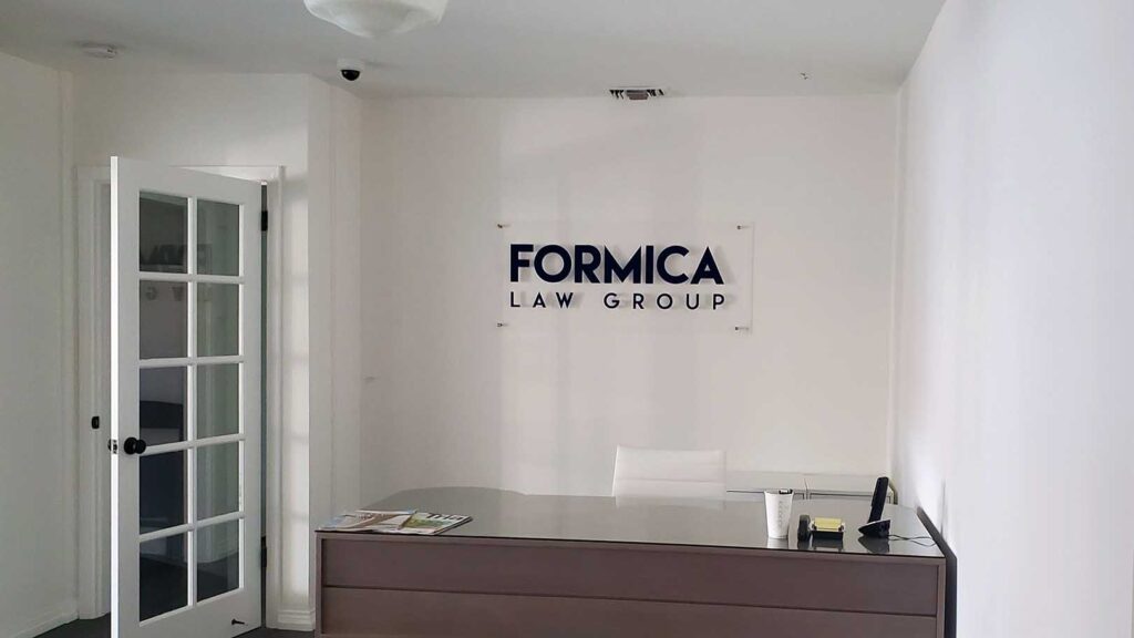 LAW GROUP- FORMICA LAW GROUP- CORPORATE IDENTITY - DIMENSIONAL LETTERS - RECEPTION AREA SIGN - LOBBY SIGN - ACRYLIC - INTERIOR SIGN - STAINLESS STEEL STAND-OFFS