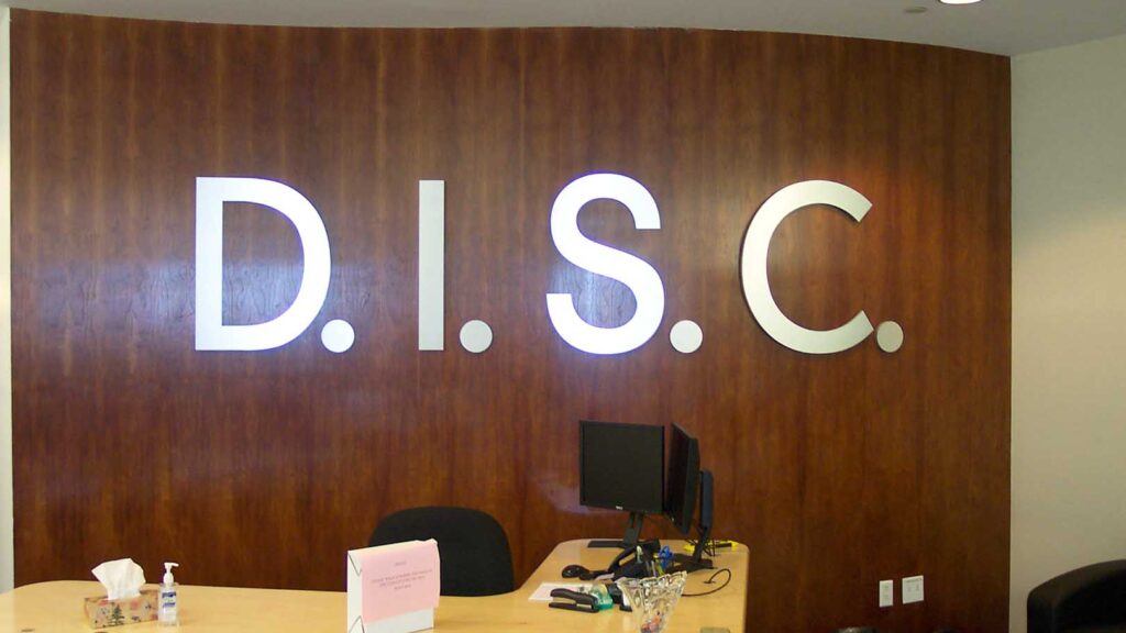 SURGICAL CENTER - DISC - CORPORATE IDENTITY - DIMENSIONAL LETTERS - RECEPTION AREA SIGN - LOBBY SIGN - BRUSHED ALUMINUM- INTERIOR SIGN