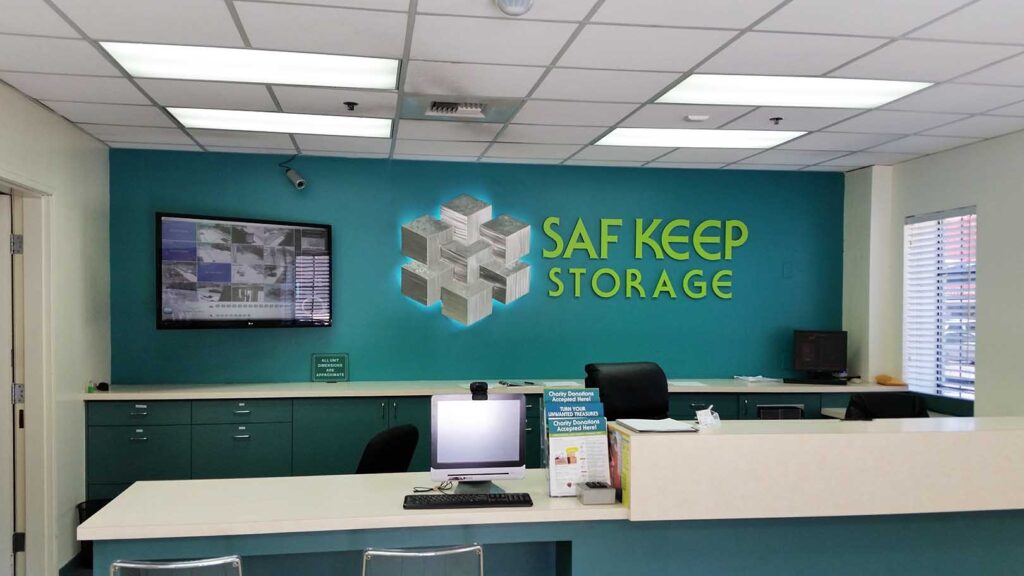 STORAGE COMPANY - SAF KEEP STORAGE - CORPORATE IDENTITY - RECEPTION AREA SIGN - LOBBY SIGN - PVC LETTERS - VINYL - INTERIOR SIGN - BACKLIT LOGO SIGN